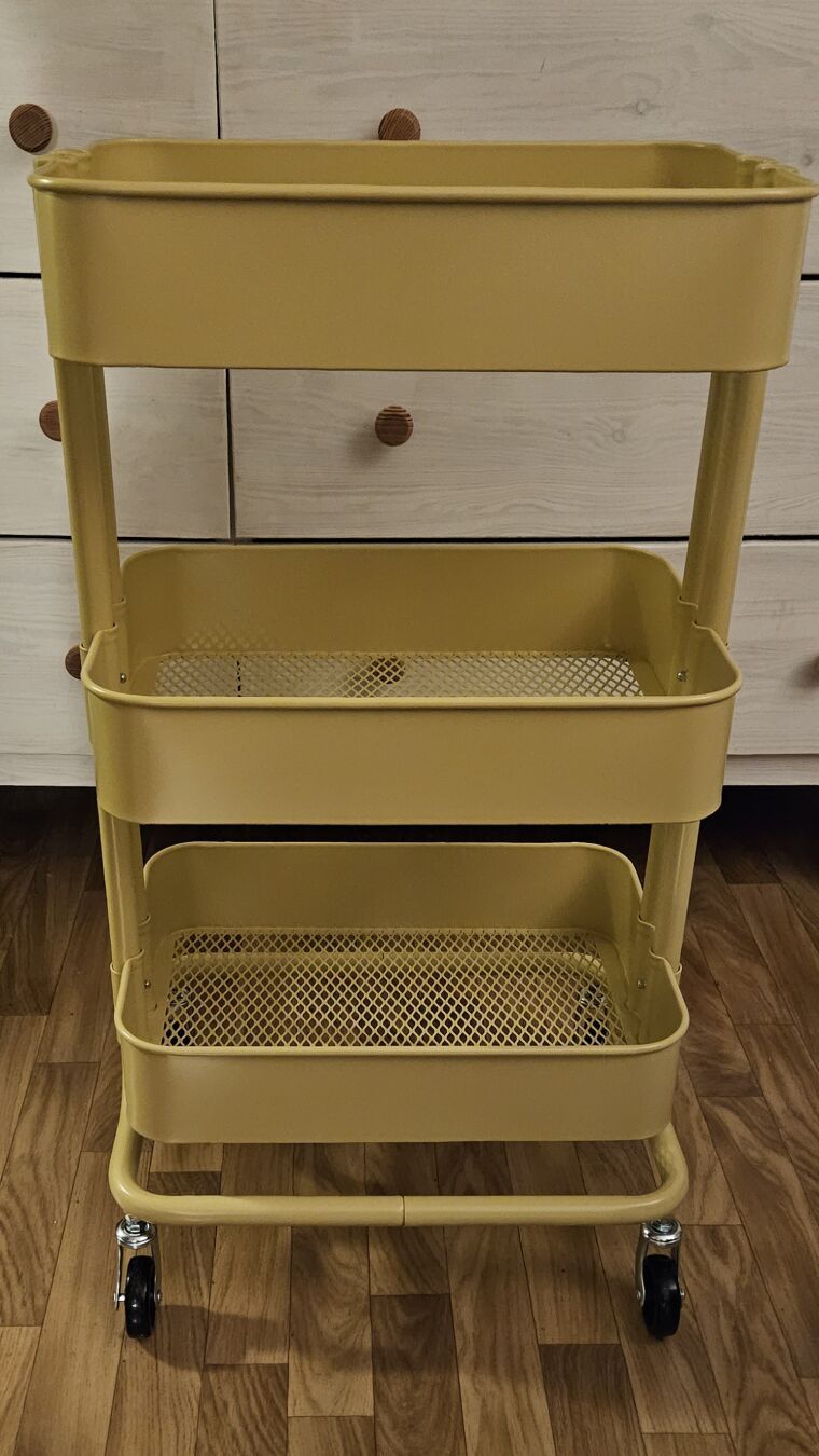 The assembled Rånäs IKEA three story cart. This one's ugly yellow.