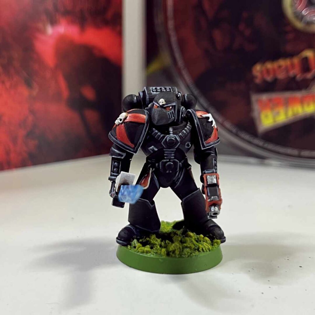 A fully painted Space Marine miniature.