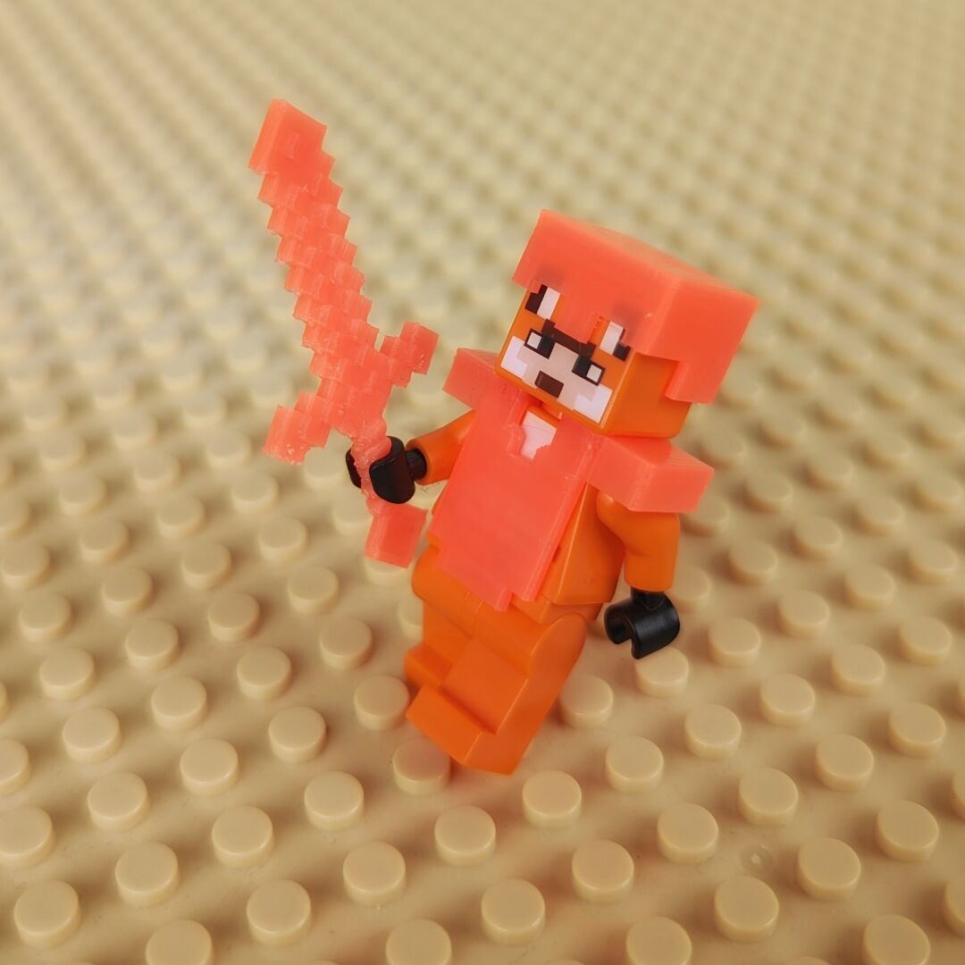 Lego-Minecraft Fuchs-Heldin mit 3D-gedruckter Rüstung und Schwert in leuchtorange