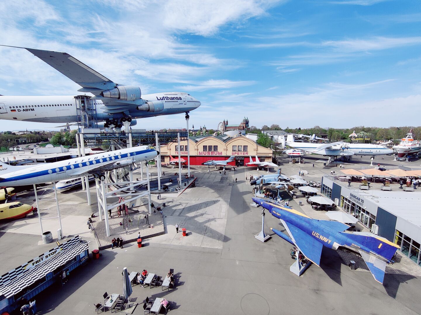 Wide angle overview over the outside museum area, with a 747 and a F-4 pprominently in view