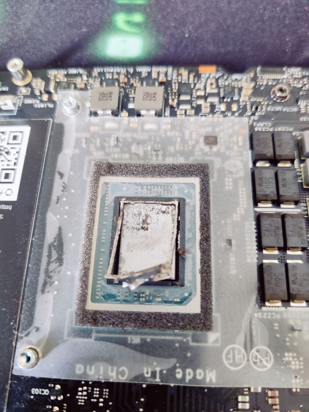 Photo of the metal boundary layer, die side. More black gunk and unevenness