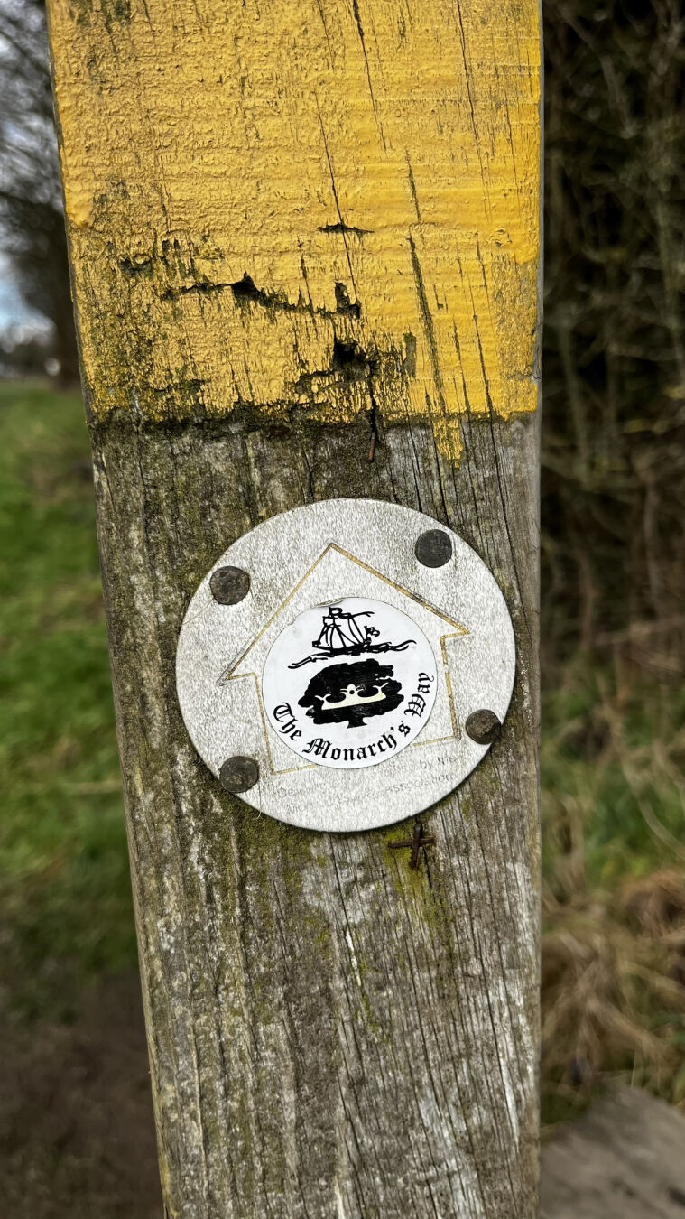 A sign for the "Monarchs Way" public walking route.